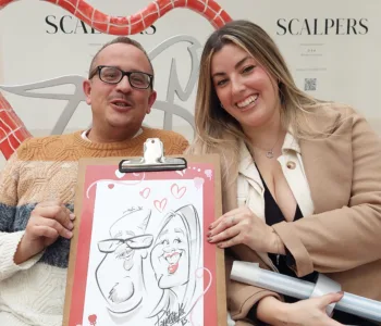 caricatura pareja centro comercial cáceres día enamorados