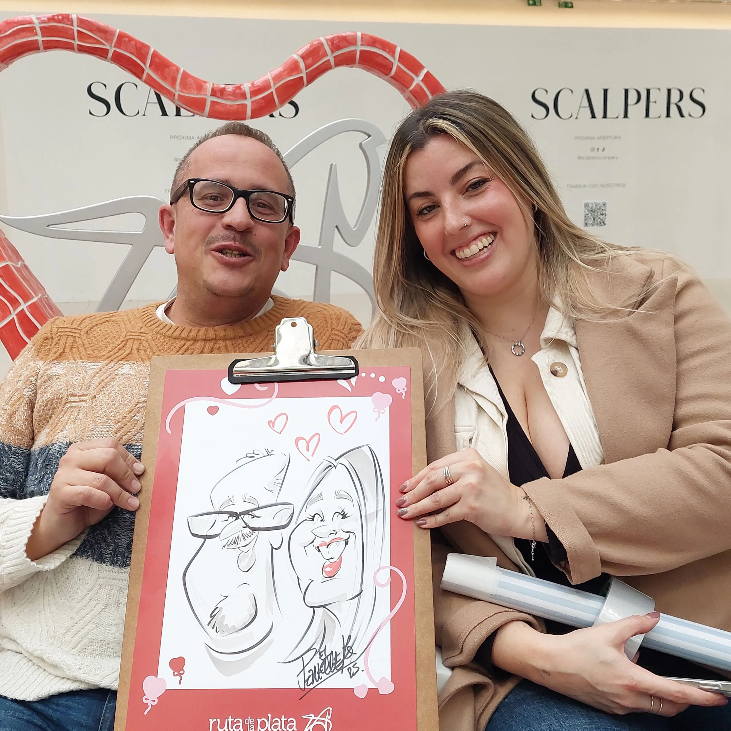 caricatura pareja centro comercial cáceres día enamorados